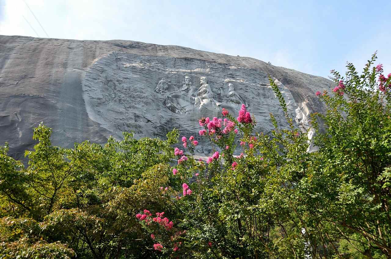 The bare granite face of Stone Mountain rising above the tree line